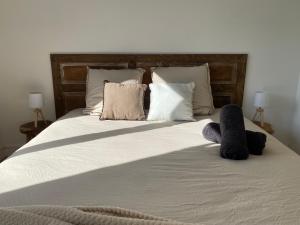 Postel nebo postele na pokoji v ubytování Appartement spacieux climatisé avec terrasse + 11 fotografií