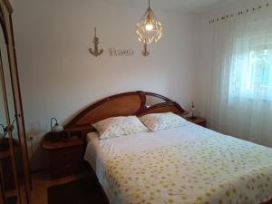 Postel nebo postele na pokoji v ubytování Apartment Patricia