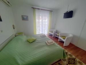 Postel nebo postele na pokoji v ubytování Bed & Breakfast Josip