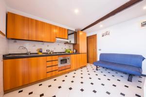 Η κουζίνα ή μικρή κουζίνα στο CasaViva Family Beachfront House in Camogli