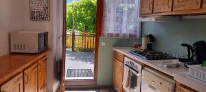 Η κουζίνα ή μικρή κουζίνα στο Appartements en Montagnes +1 φωτογραφίες