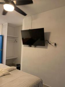 TV a/nebo společenská místnost v ubytování Playa Arena