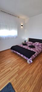 Posteľ alebo postele v izbe v ubytovaní Apartments Seven Castles