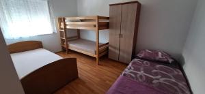 Posteľ alebo postele v izbe v ubytovaní Apartments Seven Castles