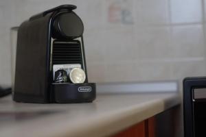 Příslušenství pro přípravu čaje a kávy v ubytování Welina guesthouse + 11 fotografií