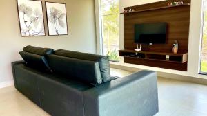 Μια τηλεόραση ή/και κέντρο ψυχαγωγίας στο Casa Lago de Furnas