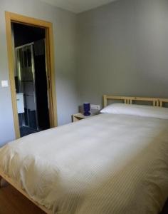 Posteľ alebo postele v izbe v ubytovaní Casa Do Ferreiro - La Fragua