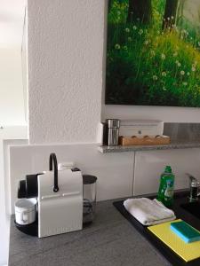 Příslušenství pro přípravu čaje a kávy v ubytování Suite-Traunsee