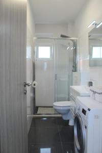 Koupelna v ubytování Luxury apartment Maestral - private pool