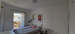 Ένα ή περισσότερα κρεβάτια σε δωμάτιο στο Vladan's Apartment