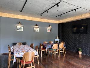 A television and/or entertainment centre at Hotel Mountime Kazbegi