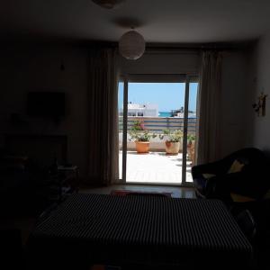 Ένα ή περισσότερα κρεβάτια σε δωμάτιο στο Joli duplex vue sur mer