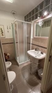 a bathroom with a shower and a sink at B&B Baldì in Pertica Alta +46 photos