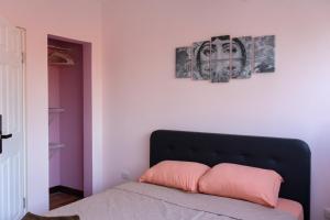 Cama o camas de una habitación en Casa Pandora Hostel Women Only