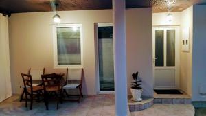 a dining room with a table and chairs at Macy in Kotor +22 photos