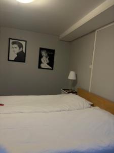 Letto o letti in una camera di Rum mitt stan