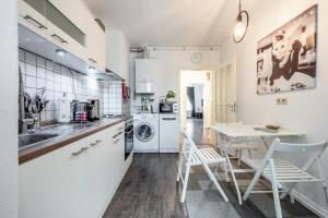 Η κουζίνα ή μικρή κουζίνα στο City Suite Hannover