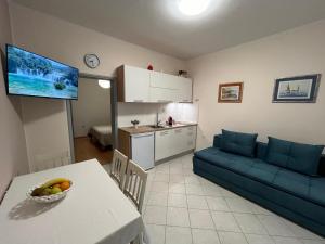 Kuchyňa alebo kuchynka v ubytovaní Apartment Filmar + 14 fotografií