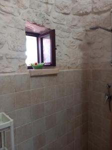 A bathroom at Trullo Monte Del Sale