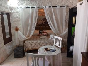 A seating area at Trullo Monte Del Sale