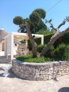 A garden outside Trullo Monte Del Sale