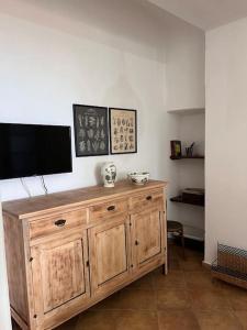 TV a/nebo společenská místnost v ubytování Casa Marisella + 30 fotografií