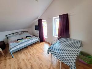 a bedroom with two bunk beds and a window at Dejan apartment4-Top centar in Pula