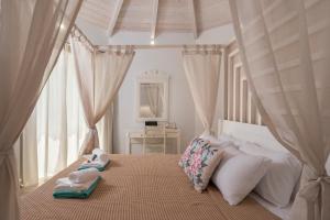 Ένα ή περισσότερα κρεβάτια σε δωμάτιο στο ilios villa Georgioupoli +89 φωτογραφίες