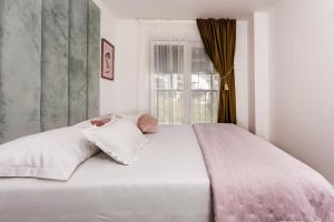 Posteľ alebo postele v izbe v ubytovaní Luxury Penthouse Duce