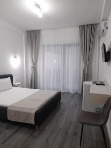 Postel nebo postele na pokoji v ubytování Vila SEA VIBES