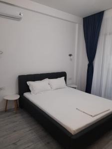 Postel nebo postele na pokoji v ubytování Vila SEA VIBES