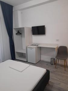 TV a/nebo společenská místnost v ubytování Vila SEA VIBES