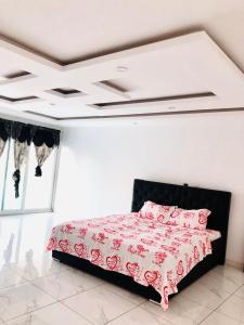 Ένα ή περισσότερα κρεβάτια σε δωμάτιο στο Residence Mofat +5 φωτογραφίες