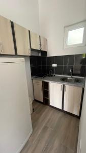 Kuchyň nebo kuchyňský kout v ubytování Apartments Toro Bar Sutomore