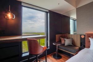 Postel nebo postele na pokoji v ubytování Hotel Metropolitan Tokyo Haneda