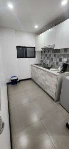 Kuchyň nebo kuchyňský kout v ubytování Apart Hotel Osaka 4 Personas