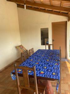 a table in a room with a lego table sidx sidx sidx at Casa verde in Pirenópolis