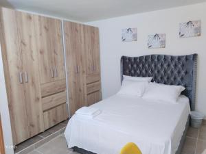 Postel nebo postele na pokoji v ubytování T7 Apartamento nuevo en Neiva + 7 fotografií