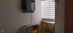 TV a/nebo společenská místnost v ubytování T7 Apartamento nuevo en Neiva