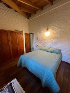 Postel nebo postele na pokoji v ubytování Habitación privada en chalet, Cipolletti + 9 fotografií
