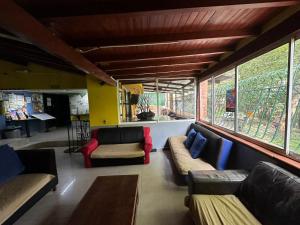 Posezení v ubytování Arcadia Hostel Medellin