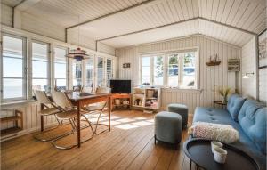 TV a/nebo společenská místnost v ubytování One-Bedroom Holiday Home In Haderslev