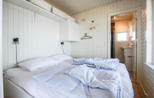 Postel nebo postele na pokoji v ubytování One-Bedroom Holiday Home In Haderslev