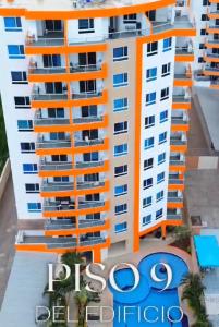 an image of a building with a hotel at Departamento Alfredd in Tonsupa