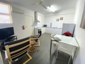Телевизор и/или развлекательный центр в Getaway Villas Unit 385