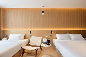 Shanghai Captain 5 Youth Hotel - Xinzhuang Metro Station 객실 침대