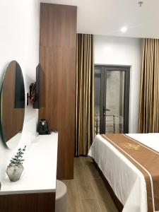 Postel nebo postele na pokoji v ubytování KING HOTEL