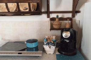 a coffee maker on a counter in a kitchen at La Piccola Bellezza in Pisticci