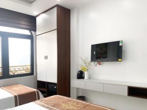 TV a/nebo společenská místnost v ubytování KING HOTEL + 25 fotografií