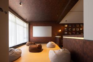 Shanghai Captain 5 Youth Hotel - Xinzhuang Metro Station 객실 침대